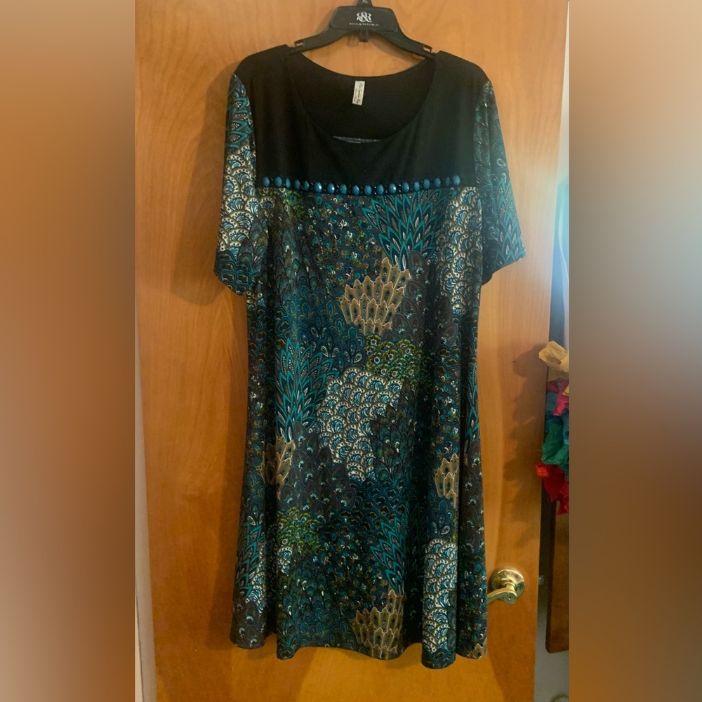 Pretty dress with stones.